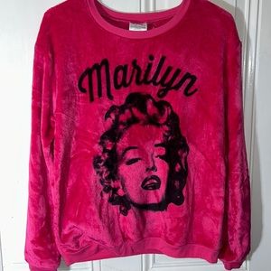 Woman’s size Medium Marilyn Monroe long sleeve shirt New without tag.